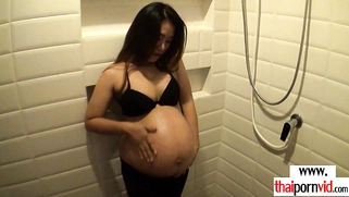 Amateur Thai pregnant Pat giving handjob