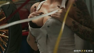 Sexy mechanic Christy Mack shows off her sexy curves