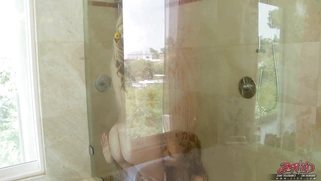 Julia Ann and Lexi Belle are kissing in the shower