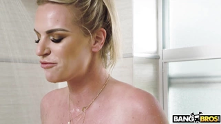 Rachael Cavalli takes the shower and plays with her pussy