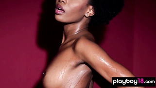 Naked ebony babe reveals her black pussy