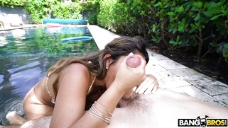 Nicole Rey is sucking the big cock and licking balls outdoors