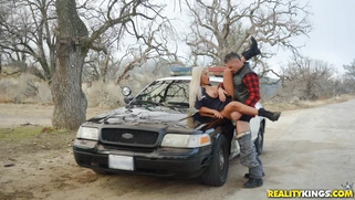 Busty cop Bridgette B gets fucked on the police car