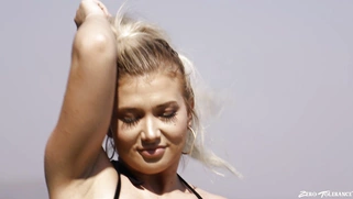 Emily Right shows off her big natural tits outdoors