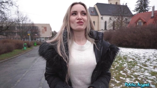 Blonde Micky Muffin is getting picked up outdoors