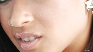 Slender ebony hottie Skin Diamond posing and stripteasing
