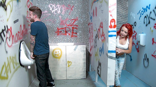 Kinky redhead Billie Rai spies on a hot peeing dude