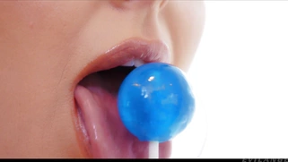 Busty mom Angela White is playing with the lollipop