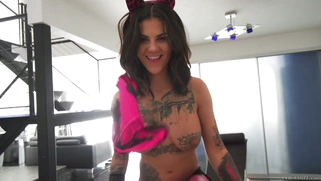 Bonnie Rotten poses in bikini, heels, fishnets and cat's ears