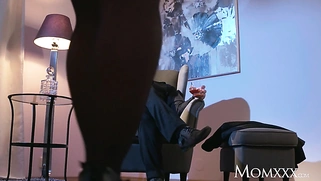 MILF in stockings and heels gives a cigar to a stallion with a gagging blowjob
