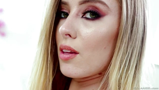 Blonde Haley Reed demonstrates her hairy pussy