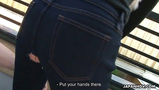 Emiri Seo gets her hairy pussy dildoed through the hole in her pants