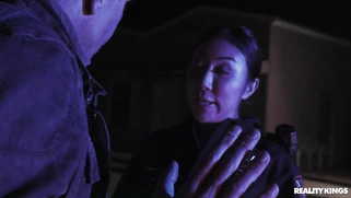 Officer Nicole Doshi is sucking Mick Blue's cock outdoors