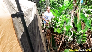 Teen Ashley Adams gives Jmac blowjob in the tent