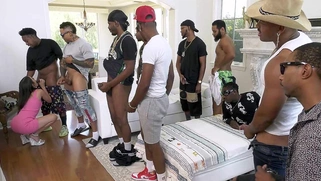 Kylie Quinn gives interracial blowjob to 13 dudes