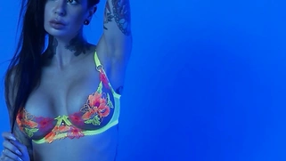 MILF slips out of her sexy neon lingerie