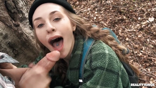 Angel Youngs is sucking Scott Nails' cock in the forest